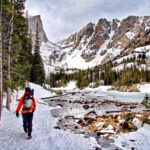 Person winter hiking in Rocky Mountain National Park, Colorado